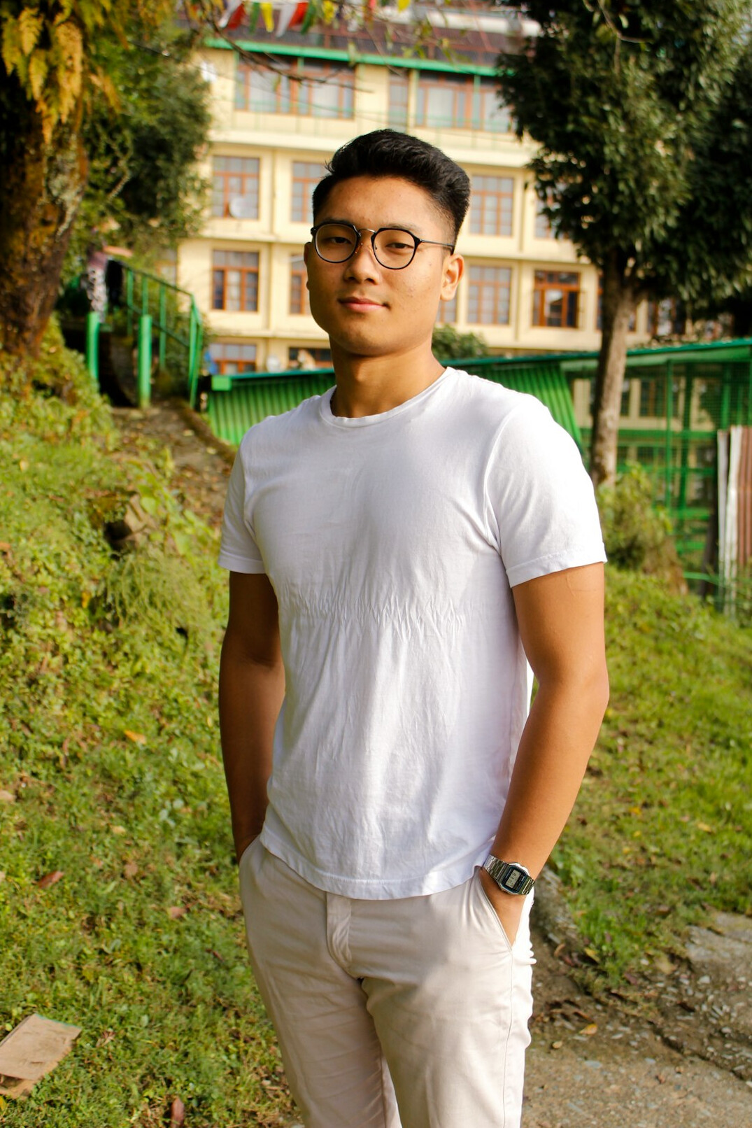 Casual portrait of a young man smiling outdoors